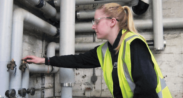 A lady doing gas maintenance